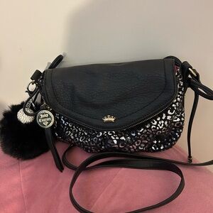 Juicy Couture Black and Silver Crossbody Bag.Gently used, added puff/bling charm